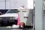 Woman Digs Thourhg a Trash Bin, Dumpster, Homeless, POUV01P02_01