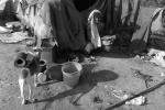 Father Feeding his Baby, shack, hut, squalor, squalid, Mumbai, India, POV35V09P14_44B