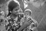 Teen mother with son, slum, Mumbai, India