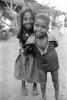 Girl smiles, boy smiling, shanty town, slum, Mumbai, India, POVPCD3306_091