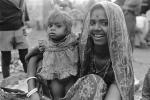 Mother and her Daughter, baby, dress, shanty town, slum, Mumbai, India
