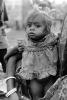 girl, baby, dress, shanty town, slum, Mumbai, India, POVPCD3306_100B
