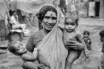Mother and her two children, slum, Mumbai, India