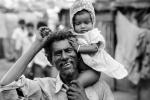 Proud Father, daughter, girl, smiles, slum, Mumbai, India