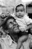 Proud Father, daughter, girl, smiles, slum, Mumbai, India, POVPCD3306_125