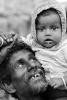 Proud Father, daughter, girl, smiles, slum, Mumbai, India, POVPCD3306_125B