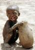 Boy eating from a bowl, Lake Turkana, refugee, African Diaspora, POVV01P07_02B