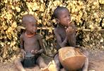 Boys eating from a food bowl, Lake Turkana, refugee, African Diaspora, POVV01P07_07