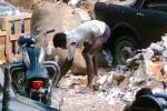 Man recycling paper, trash, Mumbai, India, POVV01P08_05B