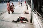 Woman lying in Pain, Crying, suffering, dying, Mumbai, India, POVV01P08_12
