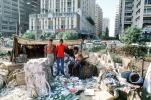 Men, Recycling Paper, homes, shack, Back Bay, Khroorow Baug, Mumbai, POVV01P09_12