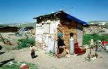 Boy, Shacks, Homes, Colonia Flores Magon, Tijuana, Mexico, POVV01P13_17