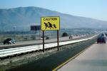 Caution Illegal Immigrant Crossing, Road sign, cars, Interstate Highway I-5, warning, Camp Pendalton, running, people, PRAV01P06_08B