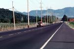 Squad car on highway, Silverado Trail, Napa Valley, CHP, California Highway Patrol, PRLV01P05_03