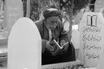Public reader in a cemetery, Iran