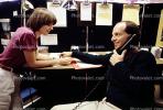 Man on the Phone, desk, cubicle, Woman, meeting, meet, converse, interacting, interaction, conversing, conversation, 1979, 1970s, PWWV01P01_08