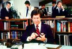 Busy office, workers, employees, phone, desk, many people, traders, brokers, stocks and bonds, 1984, 1980s, businessman, PWWV01P10_10