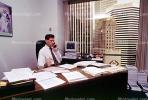 Man, Male, Paperwork, computer, phone, conversing, landline, desk, office, 1990's, businessman, PWWV05P07_05