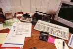 calculator, keyboard, radio, clutter, radio, cordless phone, desk, paperwork, PWWV06P14_11