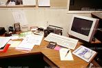 calculator, keyboard, radio, clutter, radio, cordless phone, desk, paperwork, rolodex, PWWV06P14_15