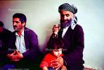 Dervish with his child, Nejar, Kurdistan, Iran, RCTV08P05_08