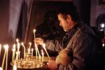 Man lighting Candles, Church Services at the end of the fighting in Tblisi, 1992, RCTV12P01_10
