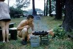 Man Lighting a BBQ, 1950s