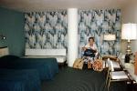 Room, Inside, Sitting, Woman, PanAm Bag, Carpet, Chairs, Beds, Sheets, Drapes, Lamp, 1960s, RVHV05P11_07