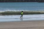 Girl Running from a Wave, Doran Beach