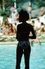 Lady Standing at a Swimming Pool, RVLV01P15_07