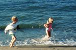 Girl and Boy playing in the water