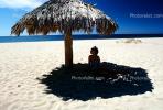 Woman on a Beach, Pacific Ocean, sand, grass thatched parasol, shade, shadow, Sod, RVLV02P08_16