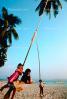Children on a Rope Swing, Beach, Baracay, Philippines, RVLV03P13_01.2655