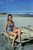 Woman sitting on a Coil of Rope, Beach, RVLV05P10_03