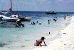 Boy Playing in the Sand, Beach Sand, Boats, Isla Mujeres, Yucatan Peninsula, Mexico