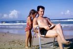 Father, Daughter, Beach, chair, Ocean, summer, 1950s, RVLV06P03_14