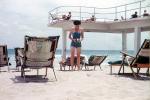 Brownie Camera, Beach, Ocean, Woman, Deck, Chairs, 1950s, taking a picture, kodak brownie, Sand, RVLV06P11_04