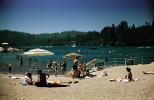 beach, sand, water, freshwater, umbrella, parasol, vintage, Lake Arrowhead, 1950s, RVLV06P15_01