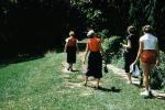 Women, walking, shorts, dress, pathway, walkway, gardens, 1954, 1950s, RVLV07P01_03