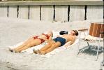 sunning, sunny, tanning, sand, beach, sun, 1960s, RVLV07P05_16