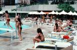 Swimming Pool, Poolside, lounge chairs, umbrellas, parasol, 1977, 1970s