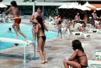 Swimming Pool, Poolside, lounge chairs, umbrellas, parasol, 1977, 1970s, RVLV07P12_03B
