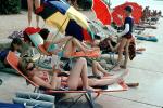 Women by the Poolside, lounge chairs, umbrellas, 1960s, RVLV08P08_07