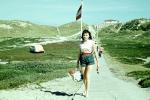 woman in shorts, walking, 1950s, RVLV08P09_01