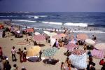 umbrella, parasol, beach, sand, water, party, waves, sunny day, 1960s, RVLV08P10_08