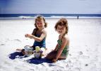 Girl, Beach, Pail, Smiles, Suntan, Sunburn, Sand, 1950s, RVLV08P10_19