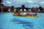 Air Mattress, Floating, Bikini Lady, Sunny, Pool, Lounging, Sun Worshipper, Ripples, Water, Liquid, Wet, Wavelets, 1960s, RVLV09P06_03