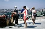 Camel, women, dress, purse, sandels, Jerusalem, 1970, 1970s, RVLV09P15_14