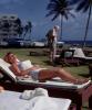 Woman Relaxing on a Lounge Chair, female, bathing suit, 1960s