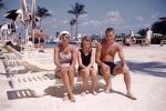 Woman, Girl, Man, swimsuits, trunks, legs, barefoot, bare feet, cateye glasses, Gulf Ocean Mile Hotel, Fort Lauderdale, 1960s, RVLV10P05_03